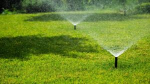 sprinkler system watering lawn